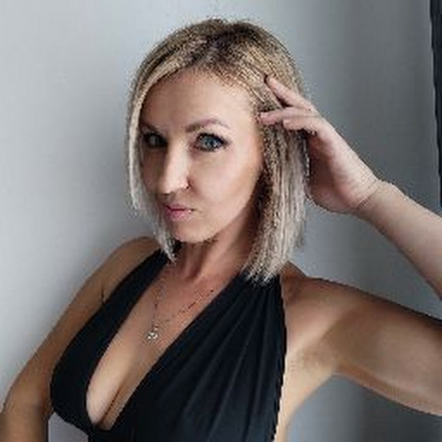 Anne Angel in a short dress