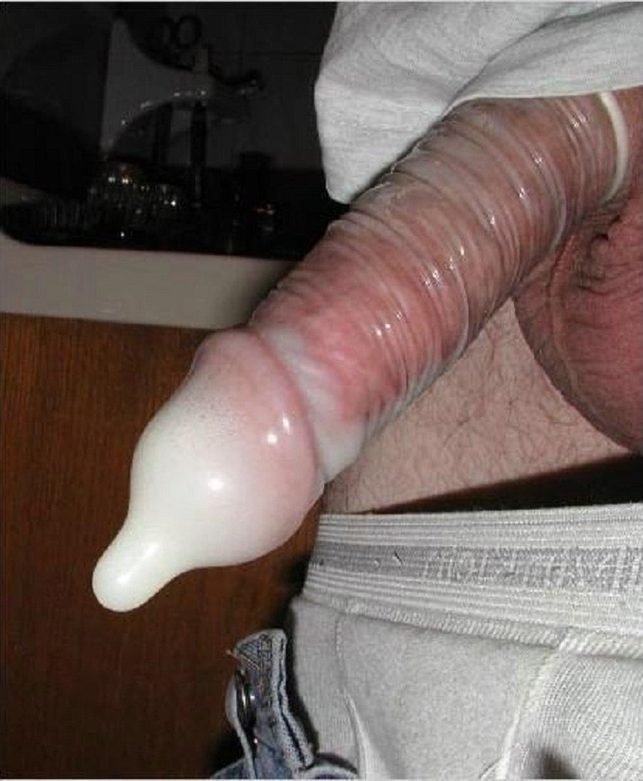 Male member in condom