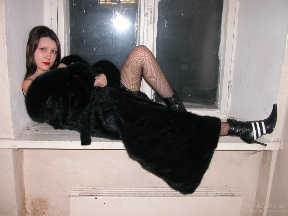 Adult woman in a fur coat