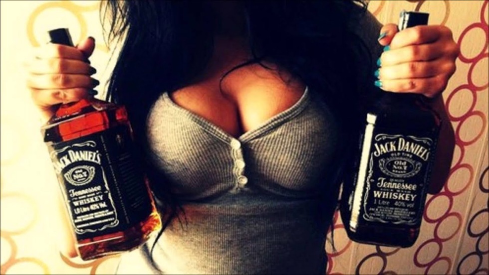 Girl with a bottle of whiskey