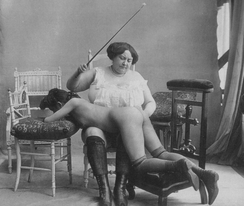 Retro bdsm flogging with rods