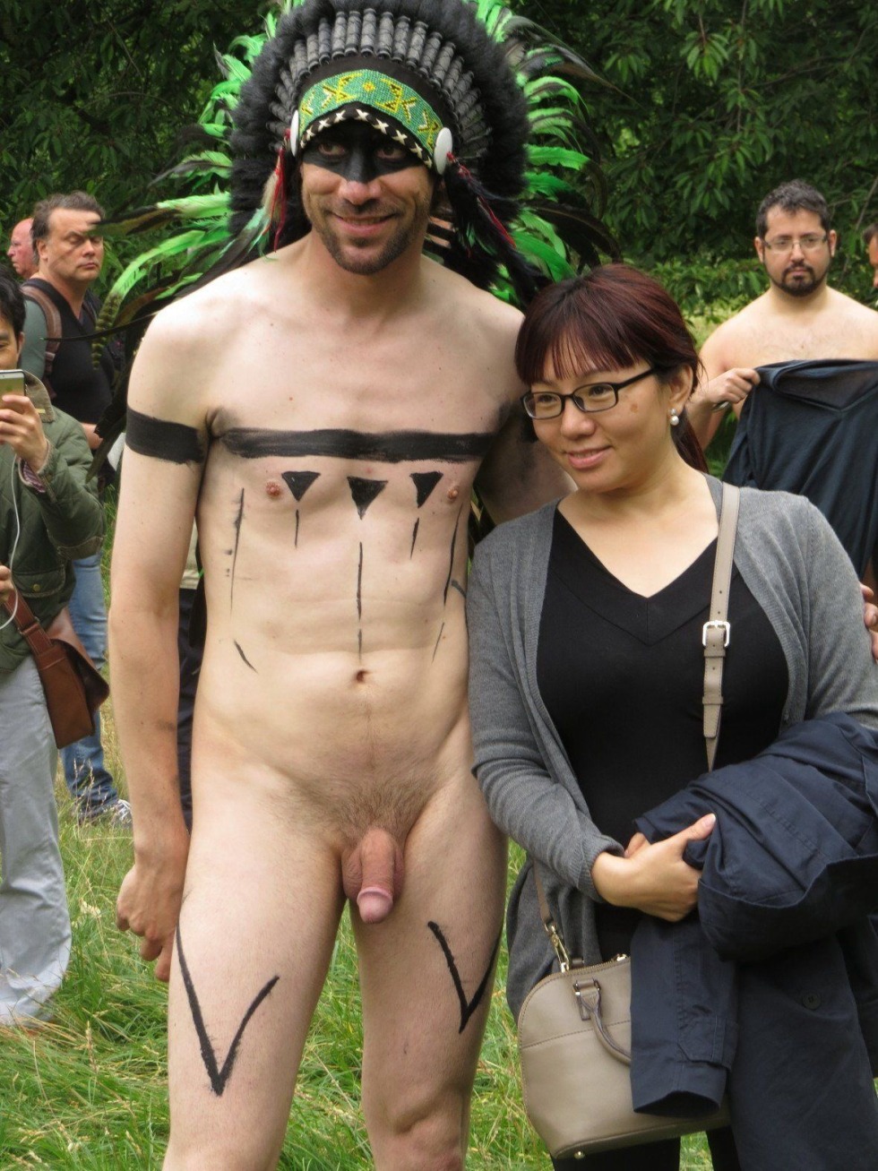 The girl looks at the penis