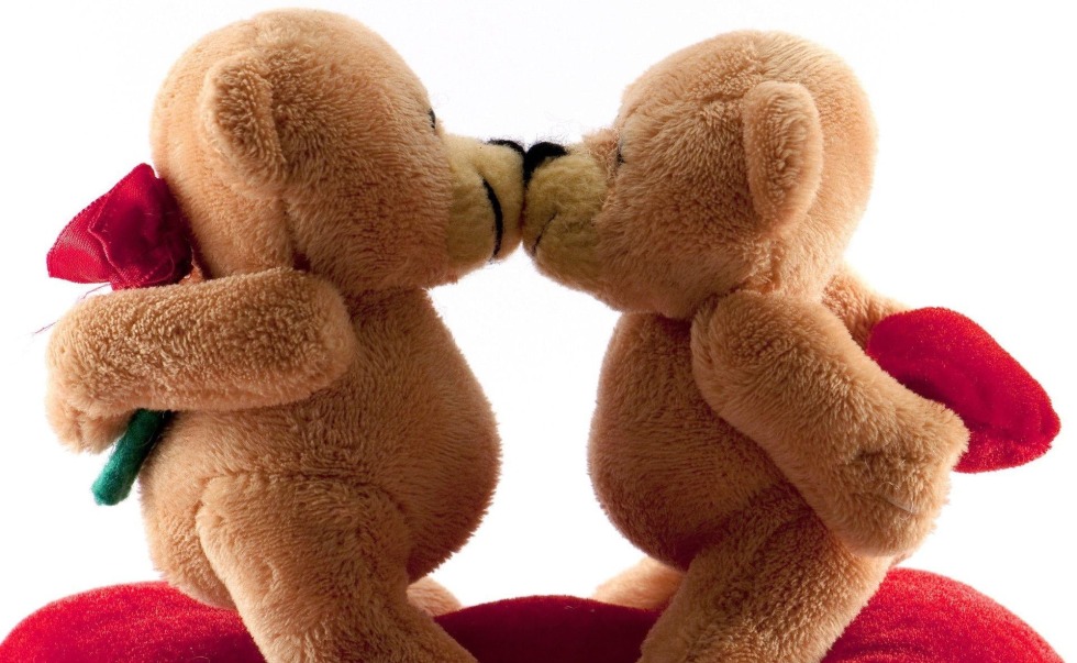 Two bears hug