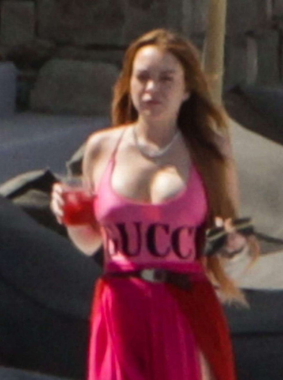 Lindsay Lohan cowards in a boat