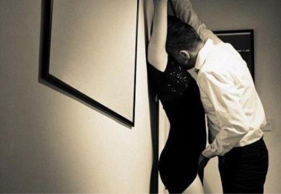 The guy presses to the wall