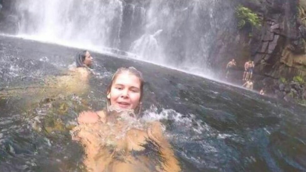 Bathing in the waterfall