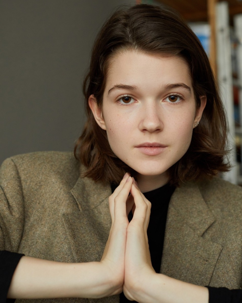 Girls pose on camera