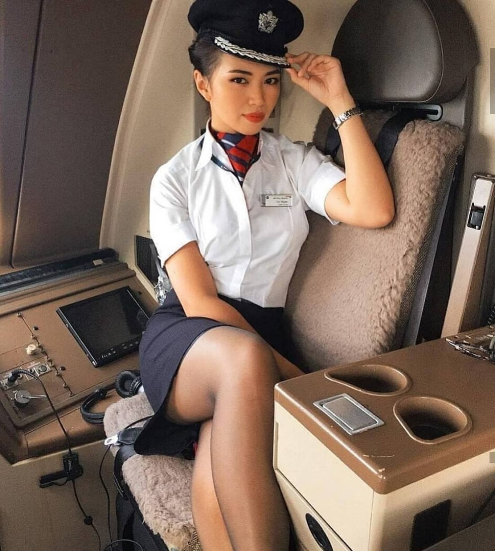 Stewardess in pantyhose without panties
