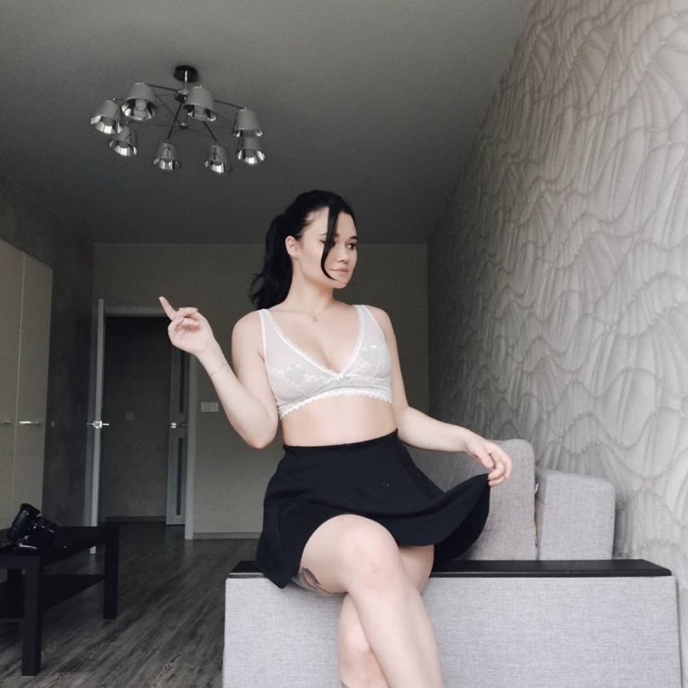 Girl nurse in bdsm gloves